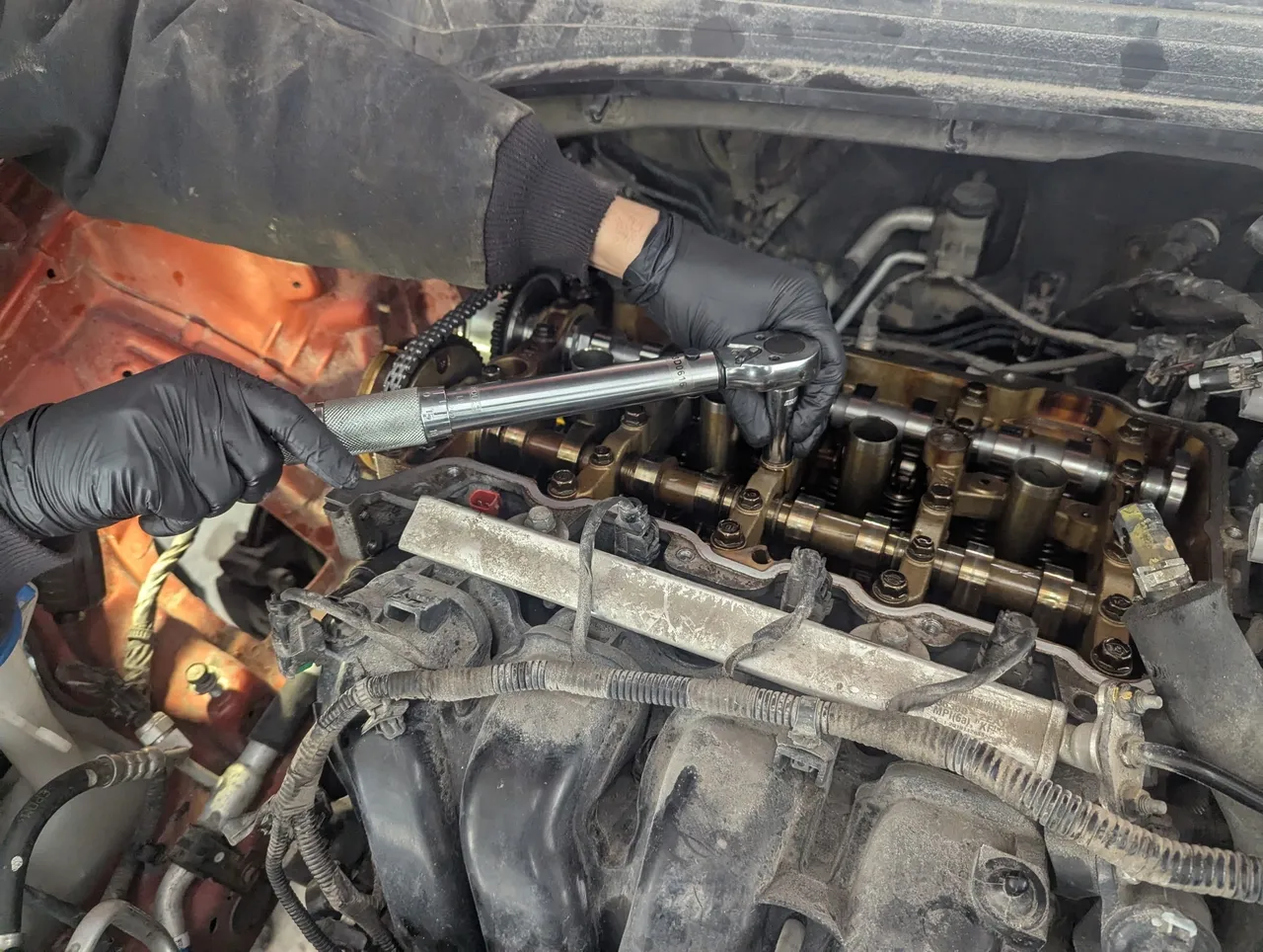 Engine maintenance with wrench