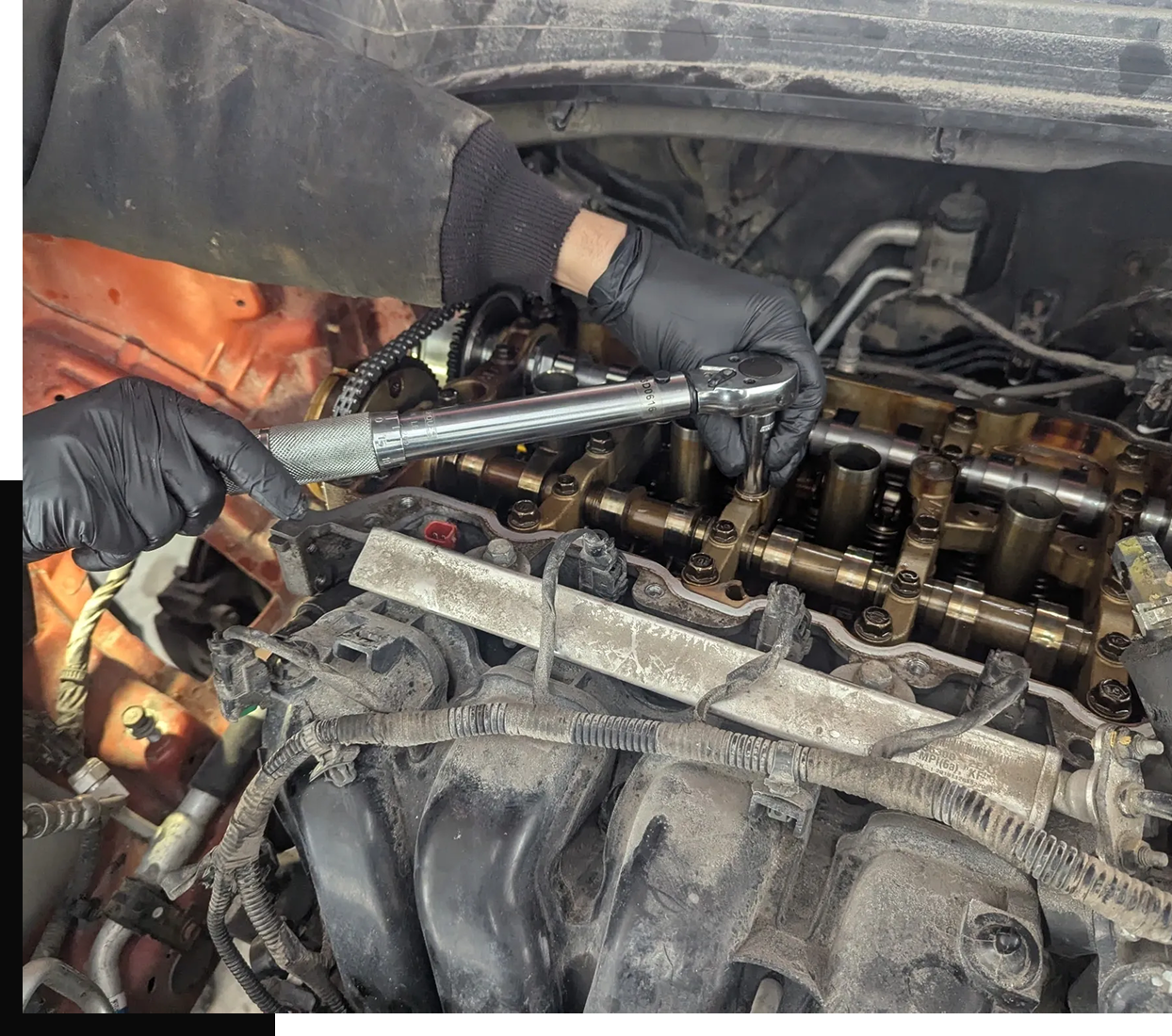 Repairing engine with socket wrench