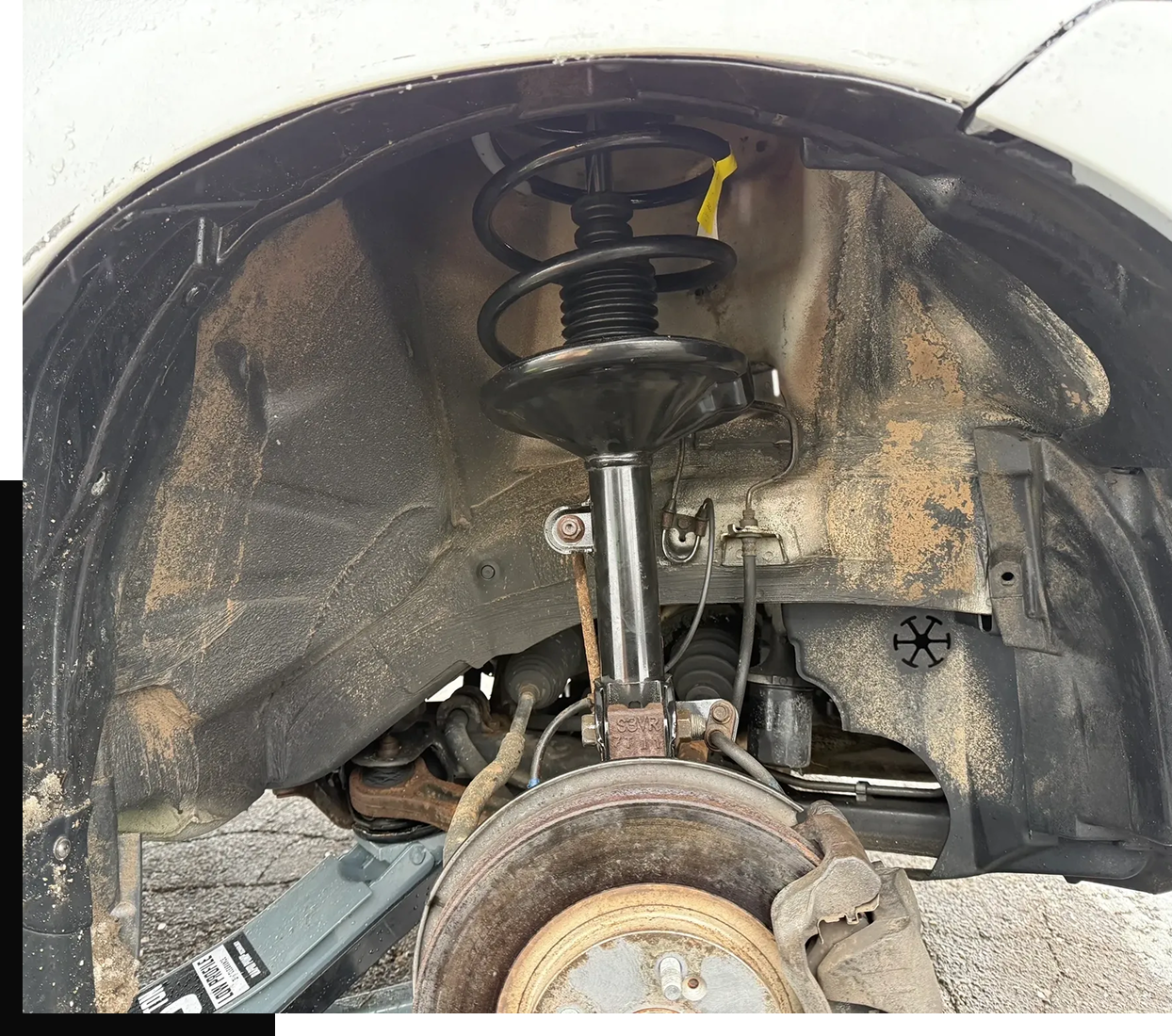 Close-up of car's suspension components