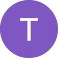 Purple circle with white letter T
