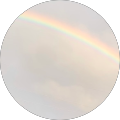 Subtle rainbow through clouds