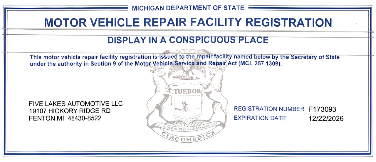Michigan motor repair license displayed